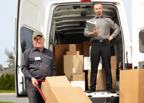 Packed boxes and furniture ready for a local home move in Covent Garden