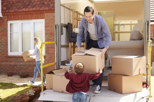Preparing boxes and furniture for transport during a central London removal