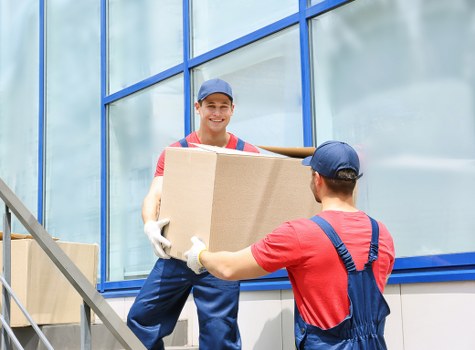 Movers handling a residential move in Covent Garden streets