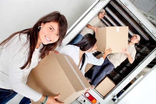Moving team navigating stairs in a period Covent Garden property